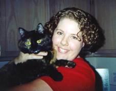 : This is a picture of the reviewer and her cat.
