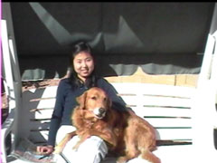 This is a photograph of Xiaolin and her dog
