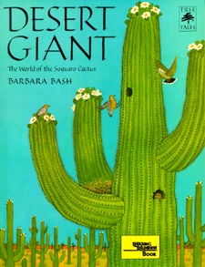 The book jacket shows a blooming saguaro with birds nesting and hovering.