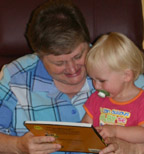 Photograph of Sue and her grandchild