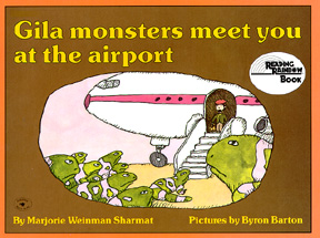 The book jacket shows gila monsters meeting an airplane passenger.
