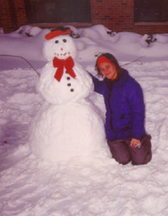 This is a photograph of Kristin and her snowman in Chicago, Illinois.