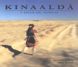 The book jacket shows a  Navajo girl running across the desert in traditional clothing.