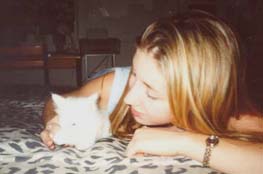 This is a photograph of Vicki and her kitten Frankie.
